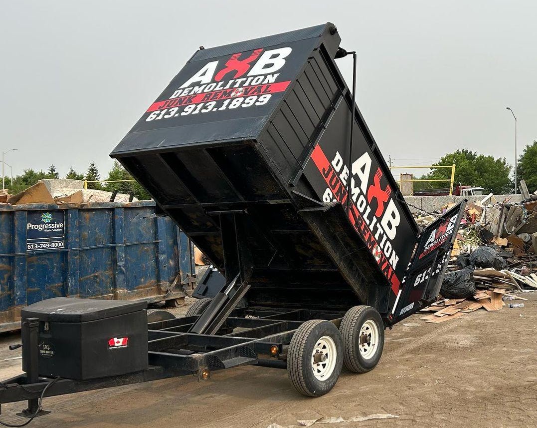 Dump truck disposing its waste material in landfill